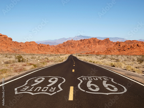 Route 66 Pavement Sign with Red Rock Mountains