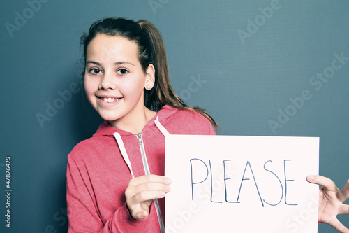 Cute little girl saying Please