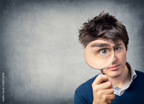 Young man with lens