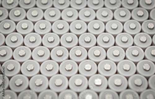 Several AA batteries in perspective closeup view