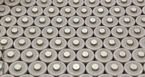 Several AA batteries in perspective closeup view