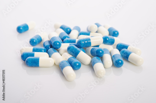 in white blue capsules