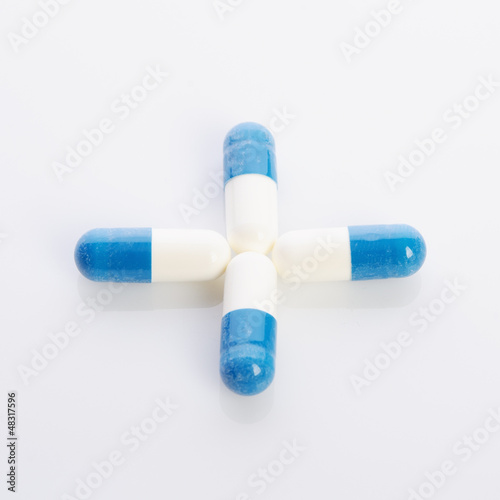 in white blue capsules