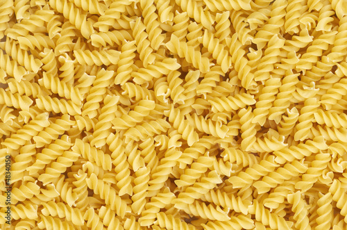 Some fusilli pasta as background pattern