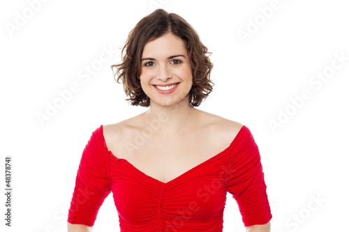 Smiling pretty woman in fashionable red top