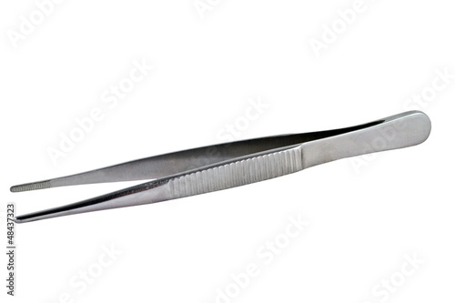 a Medical image of metallic tweezers close-up