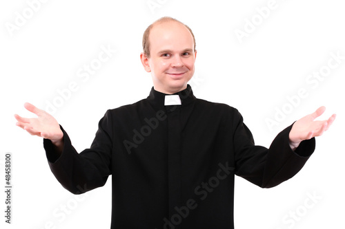 Young priest isolated on white