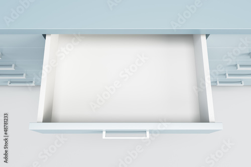 cupboard with opened drawer