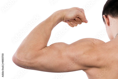 Flexing biceps isolated on white