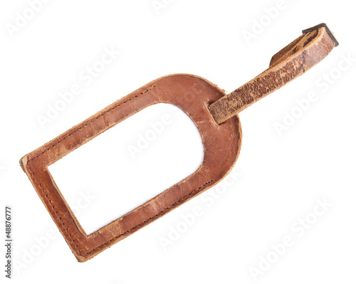 leather luggage tag isolated on white