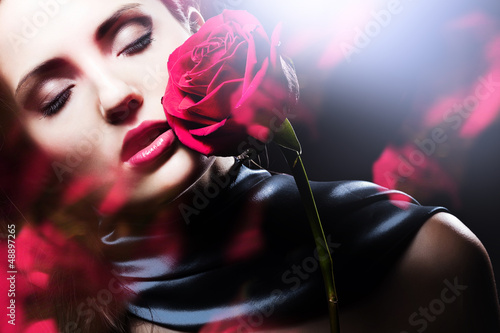 attractive woman with red rose