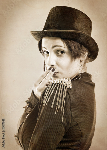 The actress of a cabaret imitates Charlie Chaplin