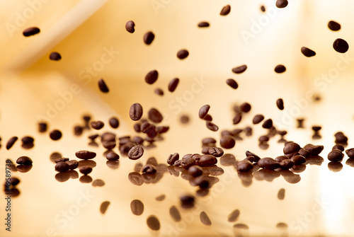 Flying coffee beans on a abstract background
