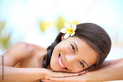 Woman natural beauty relaxing at outdoor spa