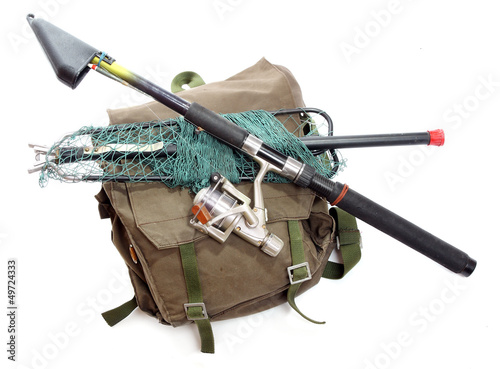 Accessories for angling - fishing rod and landing net.
