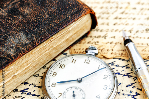Antique book and pocket watch