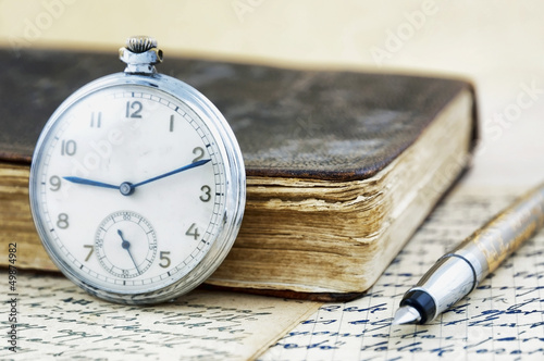 Antique book and clock