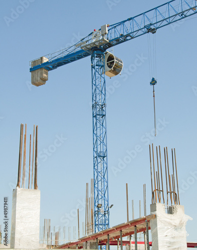 Construction crane - building a house
