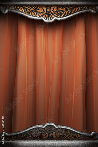 Metal on red curtain