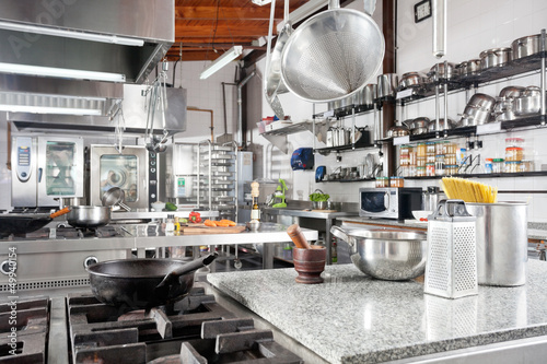 Utensils On Counter In Commercial Kitchen