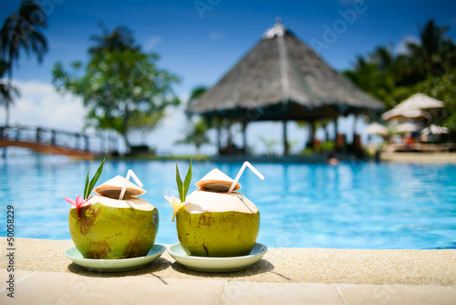Pina colada drink in front of pool