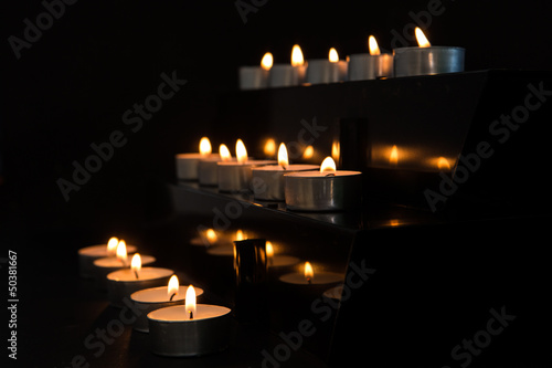 Candles at the alter in the darkness