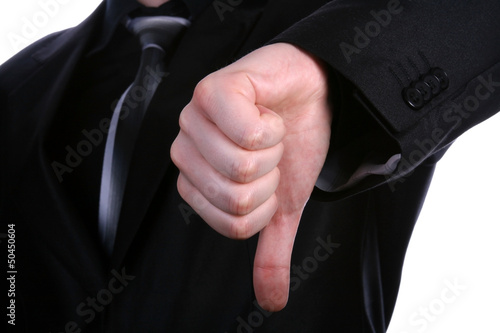 Businessman hand with thumb down