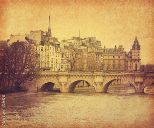 Seine.Pont Neuf in central Paris, France. Photo in retro style.