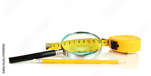 Tape measure with magnifying glass isolated on white