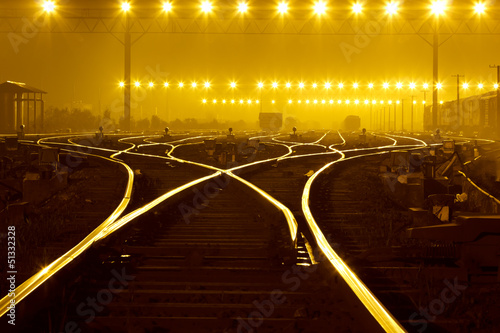 Freight train field under the curtain of night,