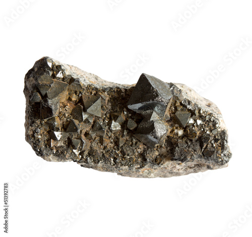 Magnetite crystals in the stone on white background