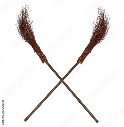 Crossed old wicked brooms isolated
