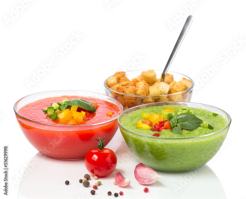 Delicious cold red and green gazpacho soup with garlic croutons