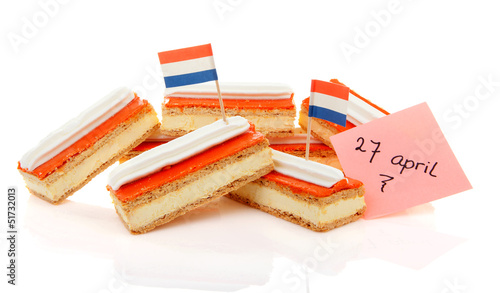 Traditional Dutch pastry called tompouce with flags