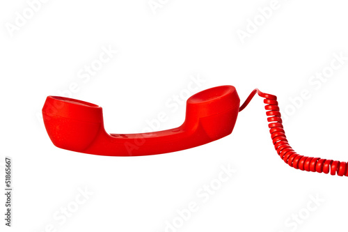 red oldtelephone receiver on white background