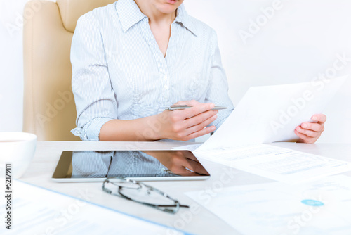 Businesswoman working with documents