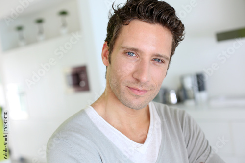 Portrait of handsome man with blue eyes