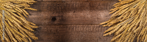 wheat on the wood background. banner