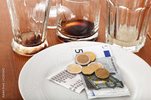 Empty glasses and plates with tip