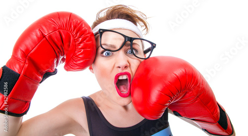 Funny fitness woman with boxing gloves