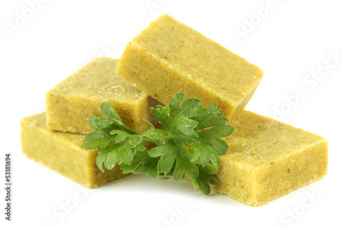 Bouillon cubes with parsley, isolated on white