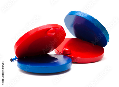 pair of red and blue castanets