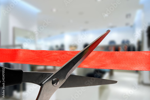 shop grand opening - cutting red ribbon