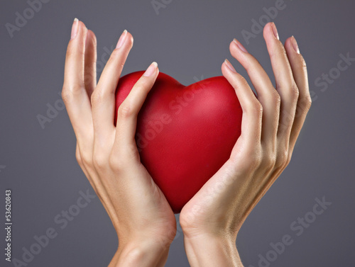heart in woman's hands