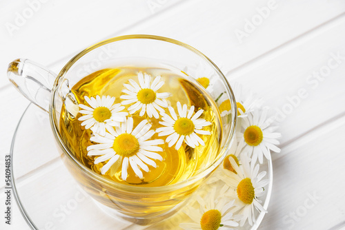 herbal chamomile tea on a white table