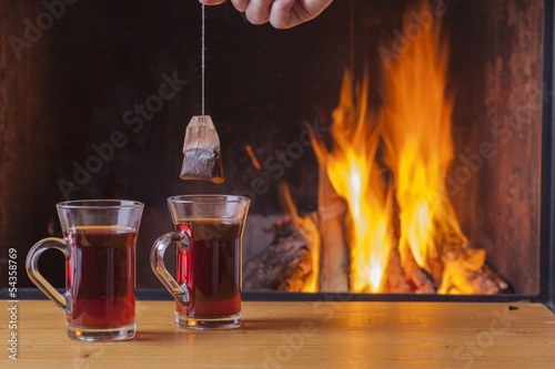 healthy tea at fireplace