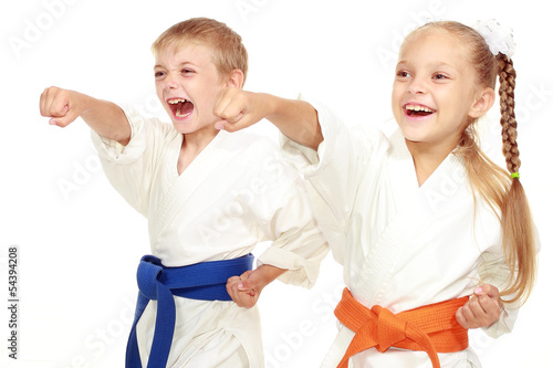 Boy and girl in kimono beat hand