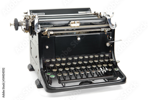 Old typewriter isolated on white.