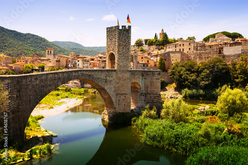 Medieval bridge with antique gate