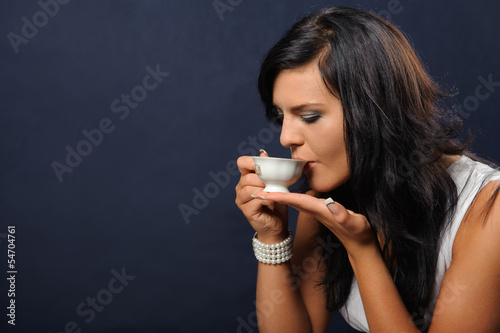 Beautiful woman with a cup of coffee.